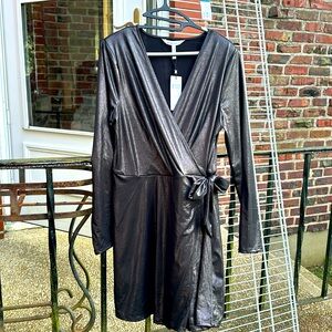 BCBGeneration girl’s dress size L in black with bow on the side.